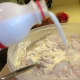 Add a quart of milk gradually just before adding the yeast mixture. 