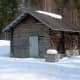 Chimneyless sauna building in Enonkoski, Finland.
