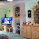 All the oak furniture and TV back in place
