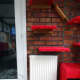 New radiator in conservatory, under the cat tree; to their delight