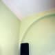 Speaker wires completely hidden behind coving and inside false arch