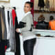 Kim Kardashian in leather pants and high heels side view