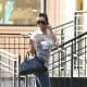 Kim Kardashian in tight jeans and high heels
