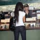 Kim Kardashian in tight jeans and high heel pumps