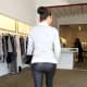 Kim Kardashian in leather pants and high heels rear view