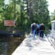 Visitors arrive at Little American Island to tour the defunct gold mine