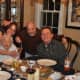 Jeff, Mark, Mom and me share a memory of a special dinner.