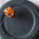 Threading the bead to attach it to necklace without crimps.