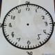 When my son had mastered telling time to the quarter hour, I found this worksheet helped reinforce the skill. The worksheet, available from Math-Aids.com (link above), is a blank clock. I put it in a plastic sleeve, so he could practice writing the h