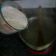 Add the sugar to boiling water, and stir until the sugar is dissolved.