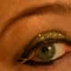 Desert Dazzle shadow over eyelid with Burnished Bling used as mascara.  Peach Prism on brow bone, and Desert Dazzle glitter over eyelid