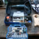 All the accessories for the dremel, including sanding disks.