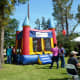 One of several inflatable bounce houses for children at Creekfest