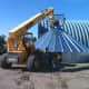 With this forklift, we'll be able to finish 5 rings of this 6 ring bin. After that, and for the final positioning on a hopper, we will need a crane.