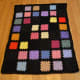 This black afghan also uses the DC - CH 1 border.