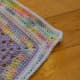 Pastel colored baby afghan border showcasing different colors.
