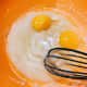 In a mixing bowl, combine the butter and the sugar. Whisk until it's well combined. Then add in the eggs and vanilla. 