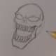 Draw in the bottom teeth and lower jaw