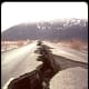 Cracked highway, Portage, Alaska. Steinbrugge Collection, Earthquake Engineering Research Center, UC Berkeley
