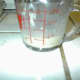 Dissolve the yeast and sugar in the warm water, according to package directions on the type of yeast you are using.