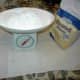 Measure the flour. I use the scale because that's how my mother-in-law taught me to do it.
