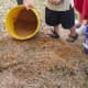 We poured buckets of water over the clay & hay. (You can use a hose for the water if you want less work.)