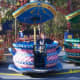 This is his favorite ride. We rode it with him the first time and then he rode it two more times. Something about spinning....