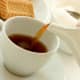 Tea contains a more mild source of caffeine than coffee.