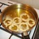 Deep frying sage and garlic onion rings