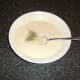 Mixing sage and garlic batter