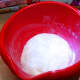 When the dough is ready, place the dough into the bowl, cover with a towel and place it in warm place for 45 minutes.