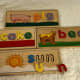 This is the Melissa &amp; Doug See &amp; Spell. Each board has a three-letter word on one side and a four-letter word on the other. 