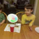 A sneak peak of my son's painted coffee filter.
