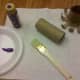 Paint the inside and outside of the toilet paper roll your desired color.