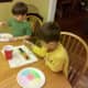 Flatten your coffee filter on a paper plate and paint with watercolors.