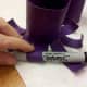 Curl the legs of the octopus upward by wrapping around a thick marker.