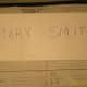 Have students write their name on the sign, in markers preferably, and display it on their desk.
