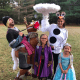 A Frozen-inspired costume featuring Elsa, Anna, Olaf, Kristoff and Sven.