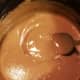 Cook peanut butter, brown sugar, and vanilla over medium heat until smooth.