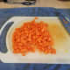 Step 8: Chop your carrots and add them to the pot.