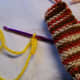 Make the Beak with about 3-4 chain stitches. Leave long ends to attach it.