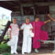 My aunt, mother, me, and my uncle are standing in front of an old stagecoach on the grounds of the Cody Homestead.