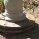 Make the easy adjustments to the carriage nuts between the two boards. The nut at the end of the bolt will need to be turned clockwise to move the board upward.