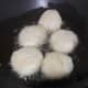 Fry the vadas in the pan.