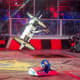 Combat robot: Aftershock (in blue at the ground) in British TV series, Robot Wars