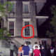 Photo contributed by reader, Steve Miller, that he took of 432 Abercorn Street while on a ghost tour, that appears to show a girl standing in the window. Steve and his wife also experienced an eerie feeling while there, and had camera troubles.