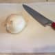 Chop a large onion into small pieces.