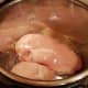 Place your thawed chicken breasts into the bottom of your pot.