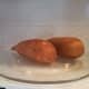 Begin by cooking your sweet potatoes. I chose to cook mine in the microwave for speed, poking fork holes in each of them first for venting.