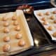 Roll your dough into balls and lay them out evenly on your cookie sheets.